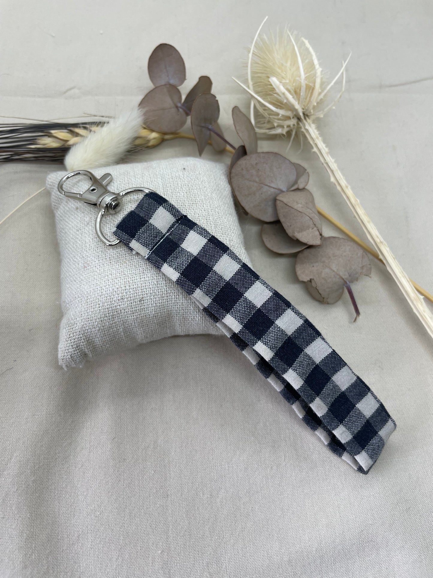 Porte-clés carreaux noirs argent