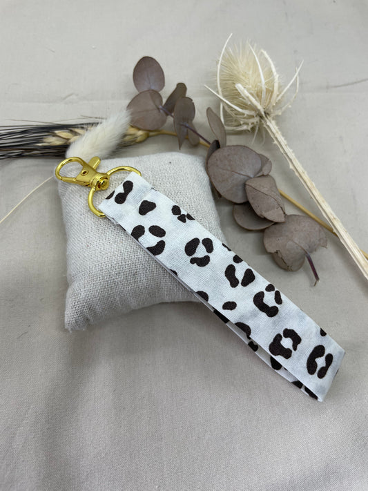 Porte-clés tacheté marron doré