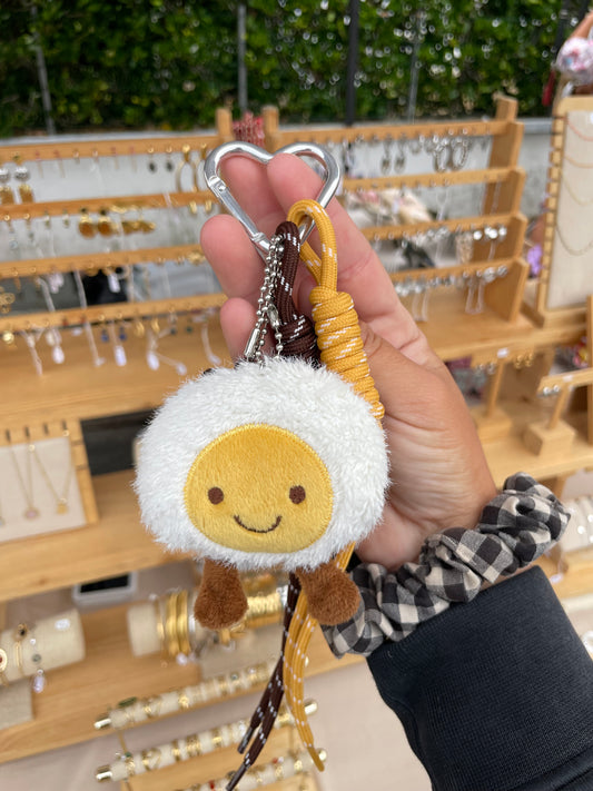 Grigri de sac œuf peluche