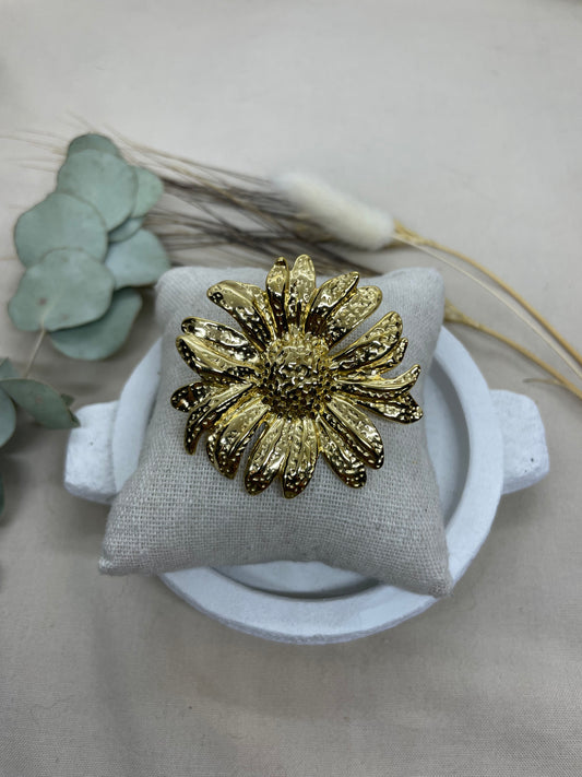 Broche tournesol doré