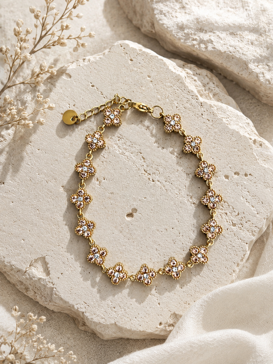 Bracelet fleurs strass rose clair doré