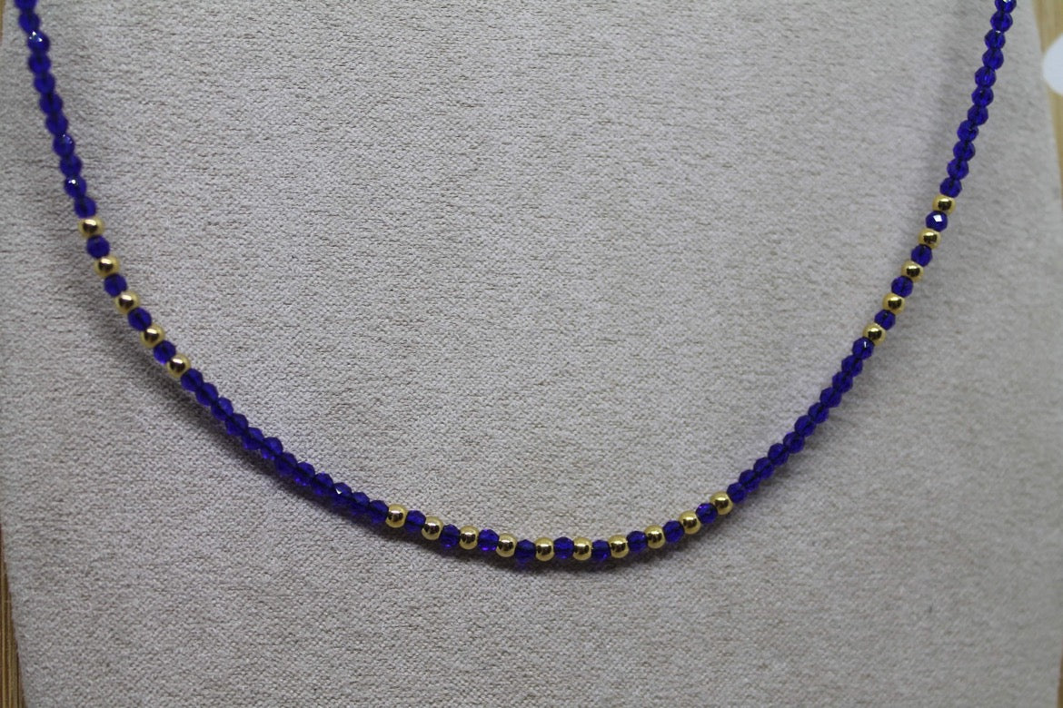 Collier perles bleues doré