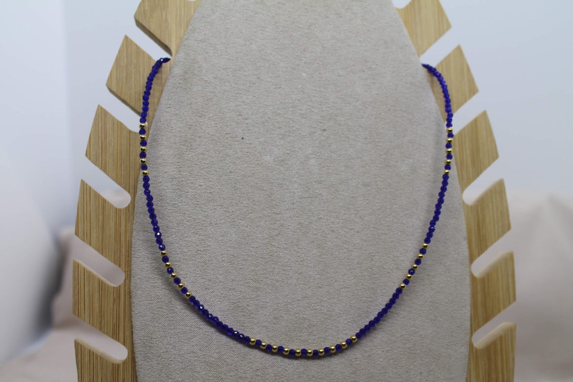 Collier perles bleues doré